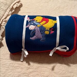 Disney Blue and Red Winnie the Pooh Blanket
Brand new.  Never used!